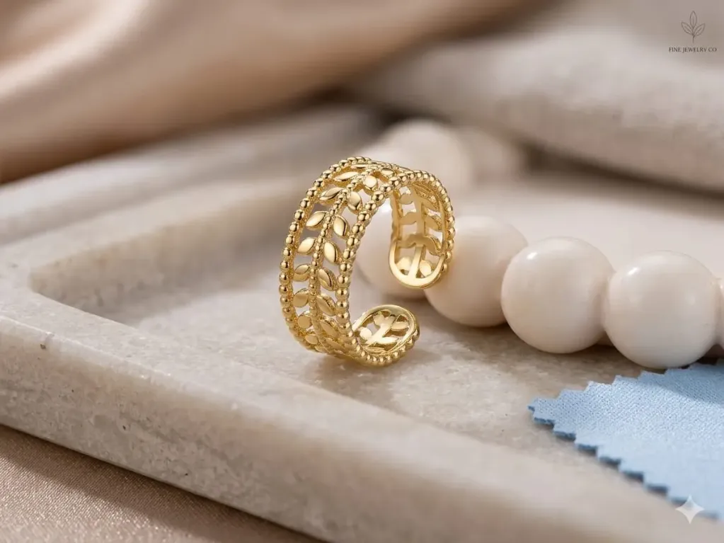 Interconnected leaf motifs Ring